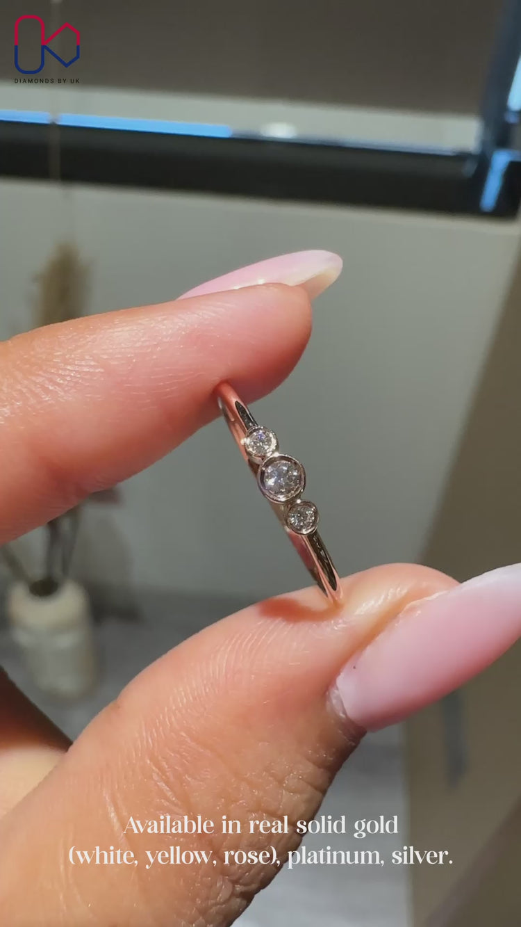 Rose gold 3 stone dainty wedding band.
