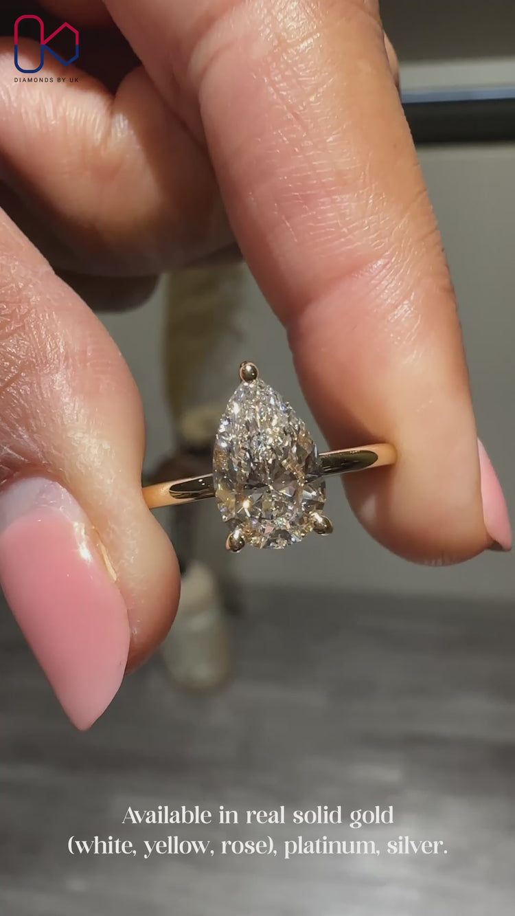 Pear cut diamond ring with solitaire setting.
