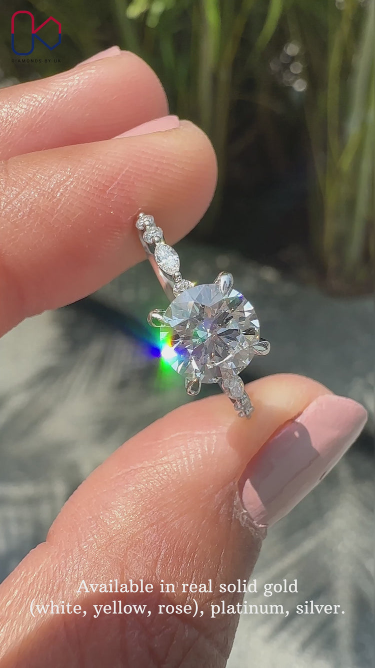 Floating bubble prong setting with a unique design.
