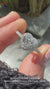 Halo engagement ring featuring a stunning heart cut diamond.