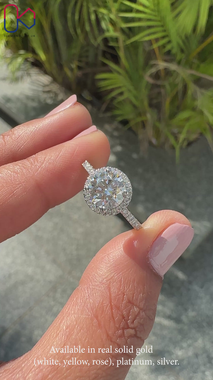 Round cut diamond ring with exceptional clarity and brilliance.
