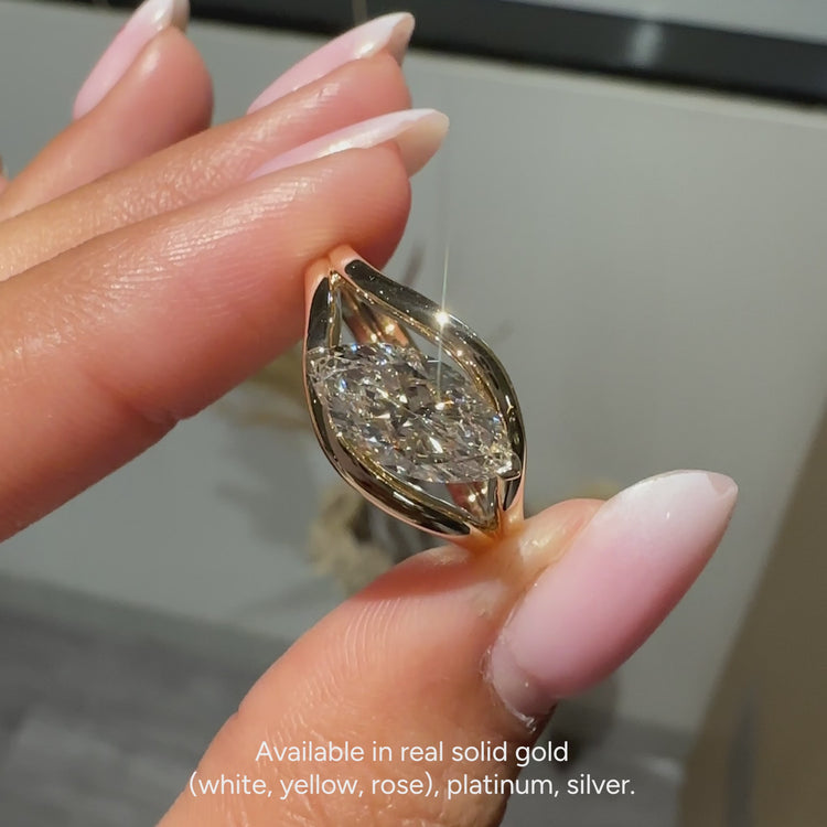 IGI certified marquise ring with east to west setting
