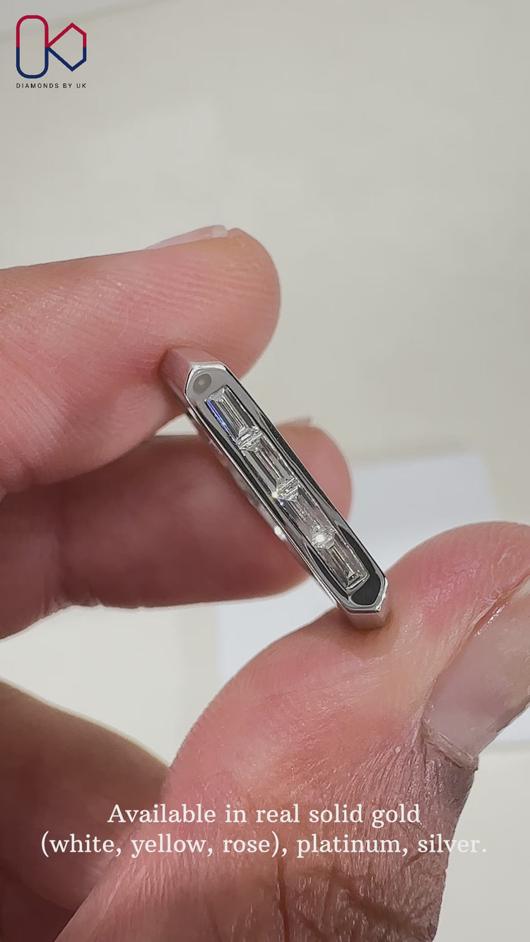 Channel set baguette wedding band with a sleek and modern design.
