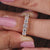 Round cut diamond band designed as a handmade jewellery piece.
