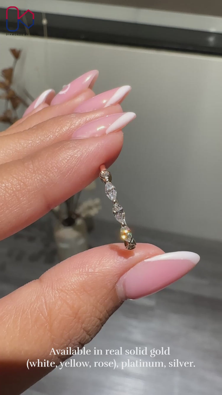 Handmade five stone diamond band with marquise stones.
