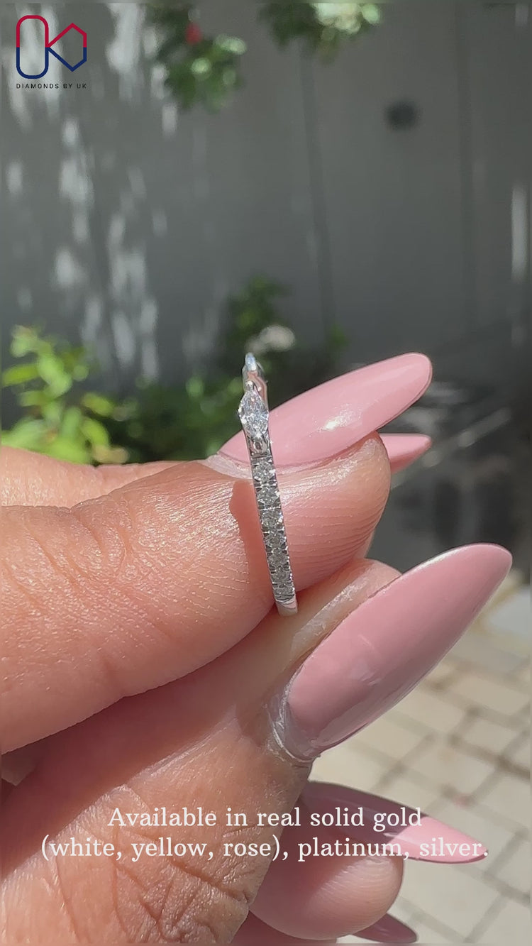 Beautiful white gold diamond band featuring sparkling diamonds.
