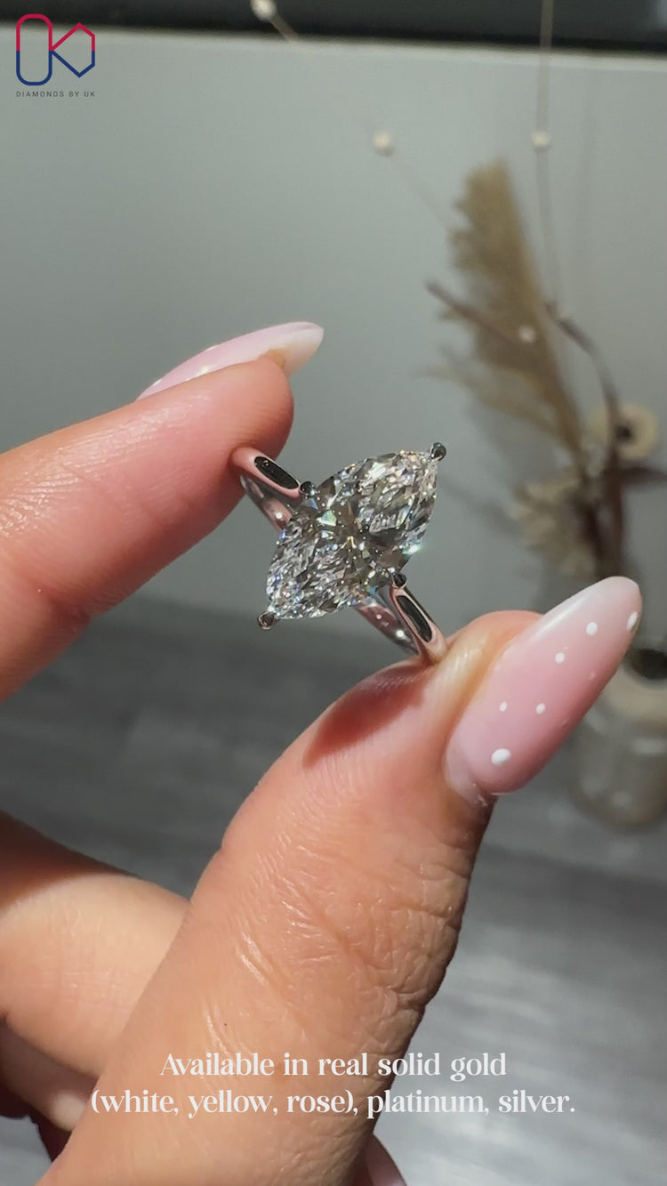 Handmade IGI Certified marquise diamond ring.
