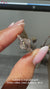 Lab grown oval ring with six claw prong setting.
