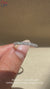 White gold band with marquise and round diamonds.