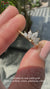 Marquise diamond wedding band featuring stunning stones and delicate craftsmanship.
