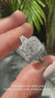 Halo diamond ring featuring a radiant cut diamond for extra sparkle.