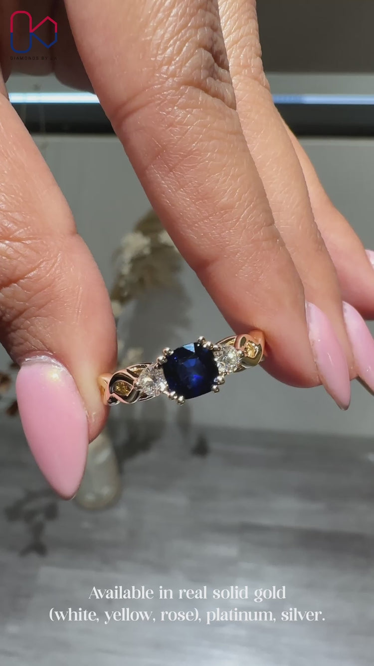 Cushion cut blue sapphire engagement ring.
