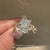 IGI certified radiant cut diamond ring with leaf prongs.
