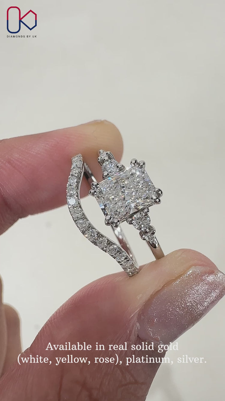 Handmade radiant cut ring with round diamond wedding band.