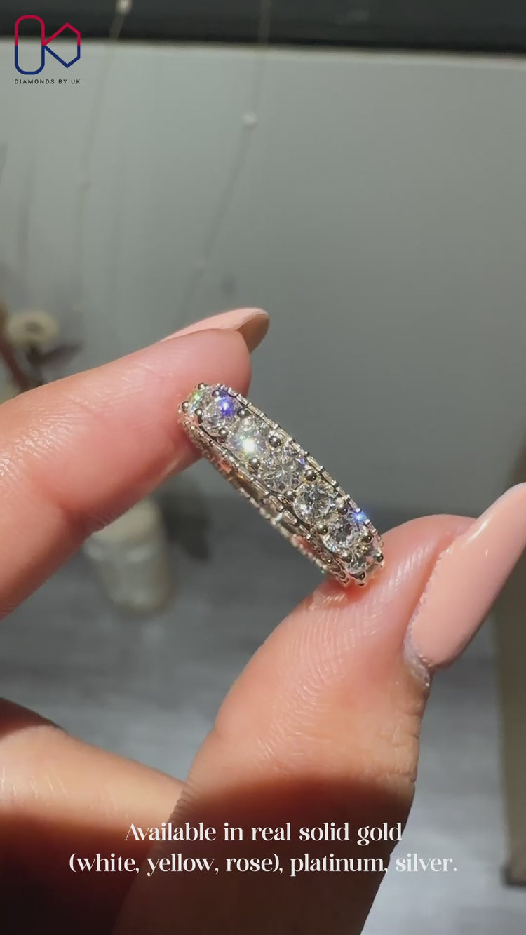 Handmade round cut diamond wedding band with eternity style.