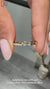 Lab grown diamond wedding band with east to west setting.