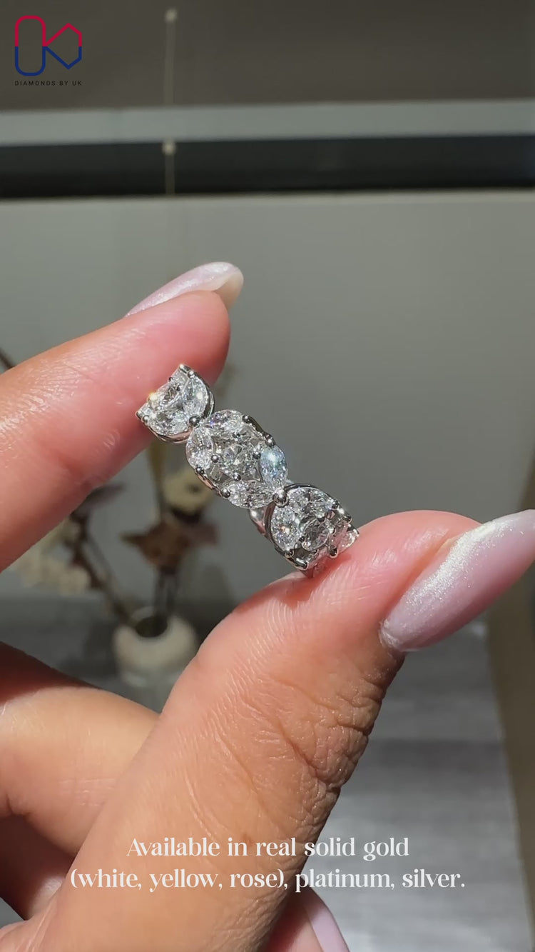 Full eternity wedding band with marquise and round diamonds.
