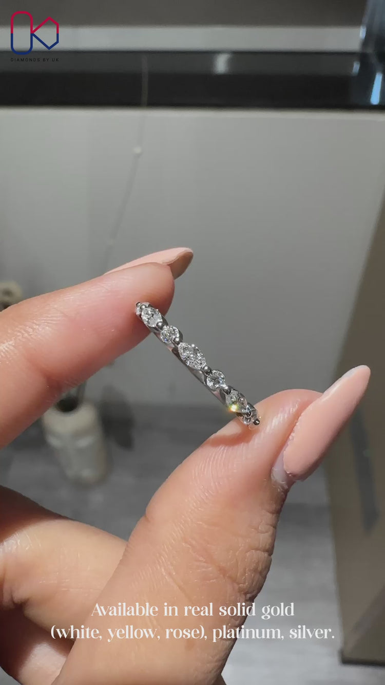 Handmade lab grown marquise and round diamond band.