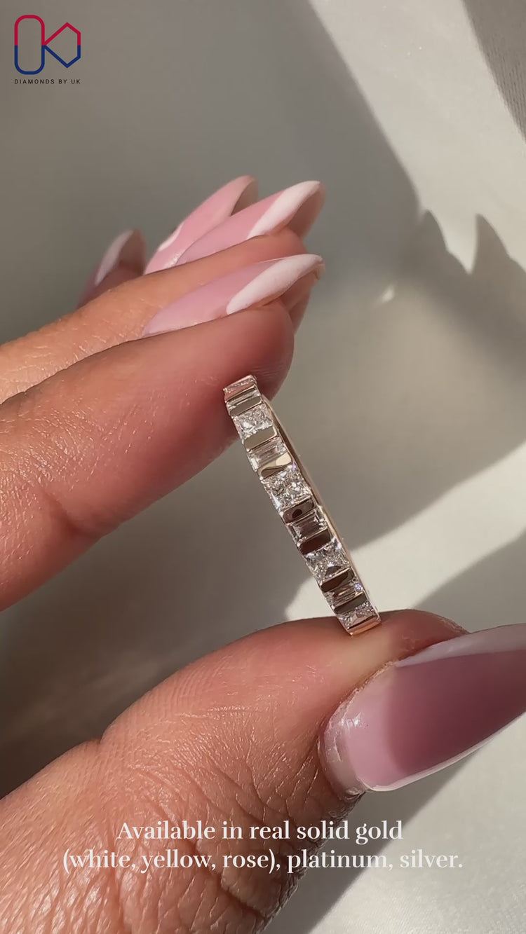 Full eternity band with baguette and princess cut stones.
