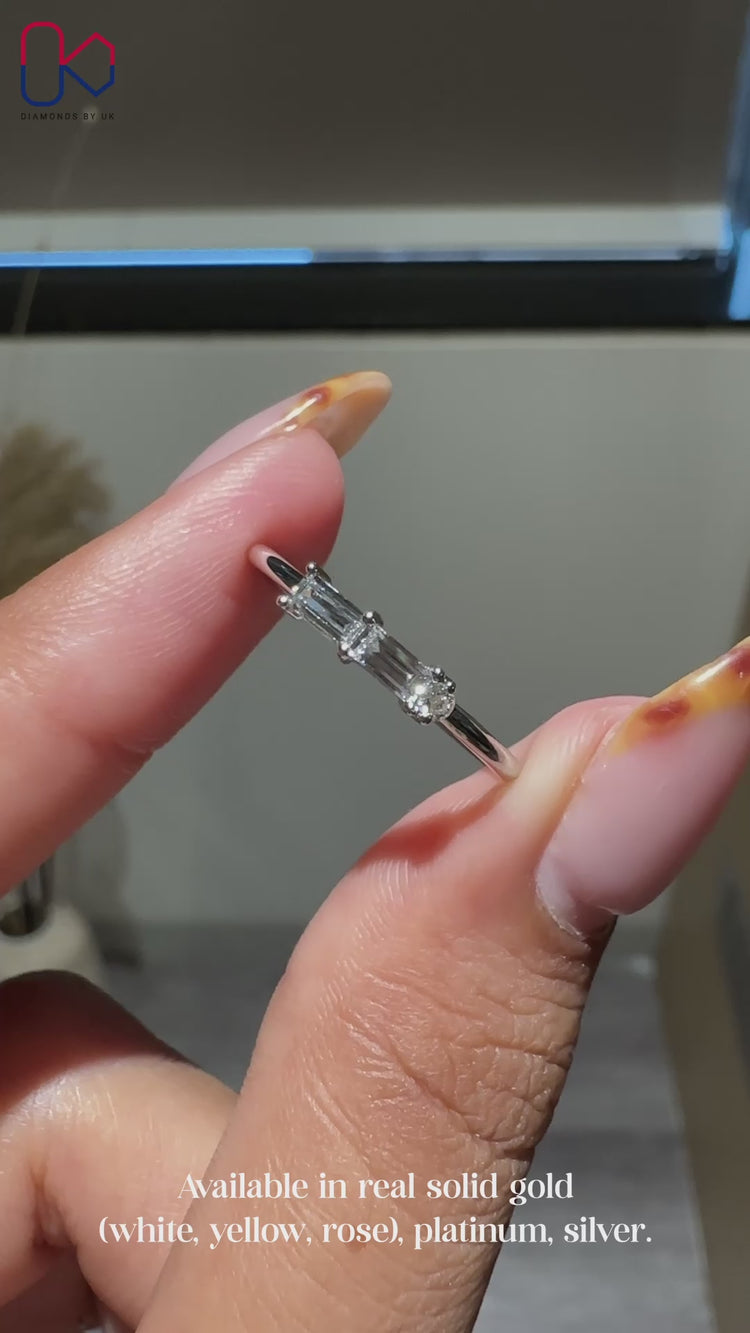 Minimalist white gold diamond band with prong setting.
