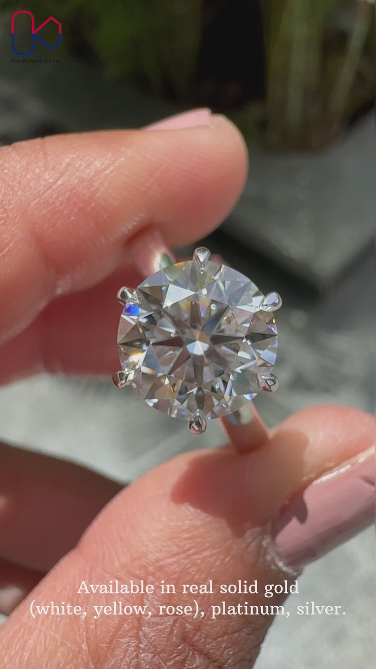 Handmade jewellery featuring a round diamond engagement ring in a 6 prong claw setting.