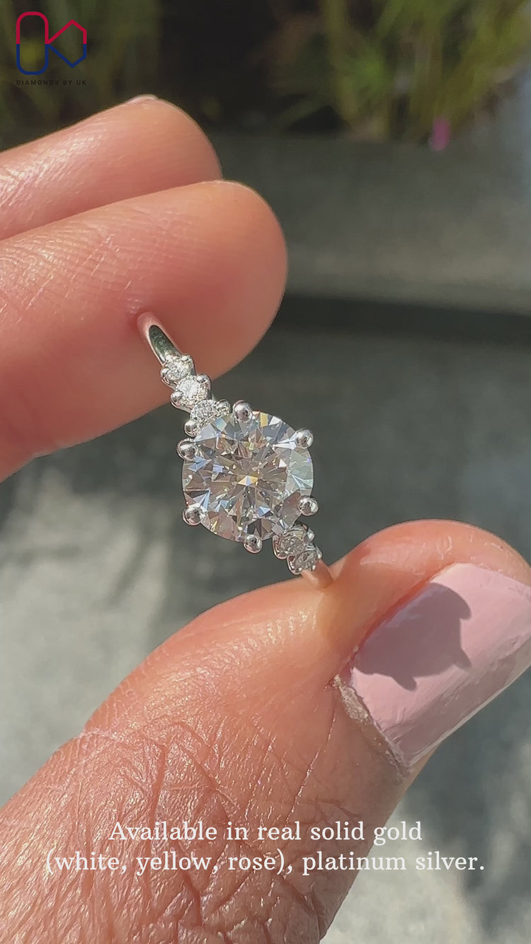 7 stone diamond ring with a classic white gold diamond ring setting.
