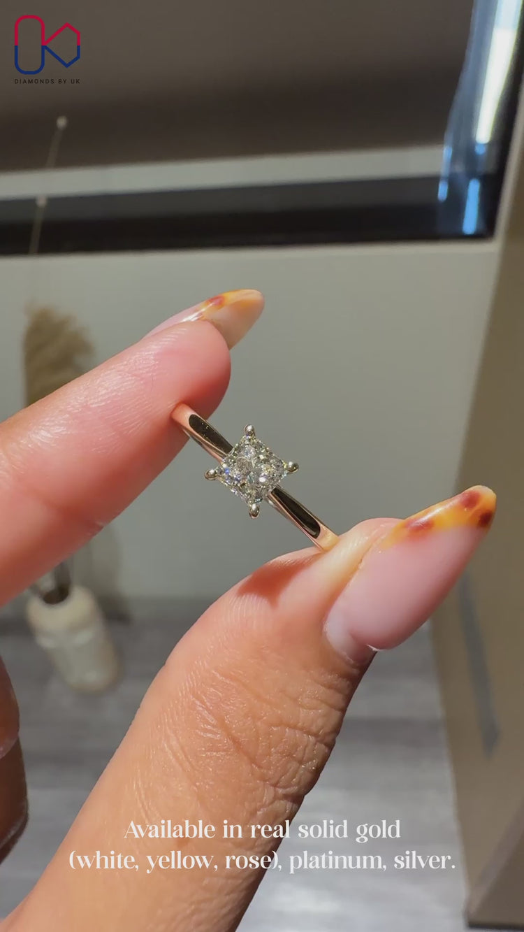 Lab grown princess cut solitaire diamond ring.