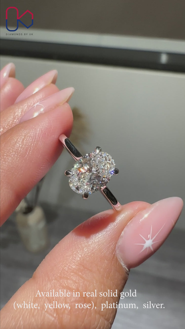 Oval diamond ring and solitaire engagement ring.
