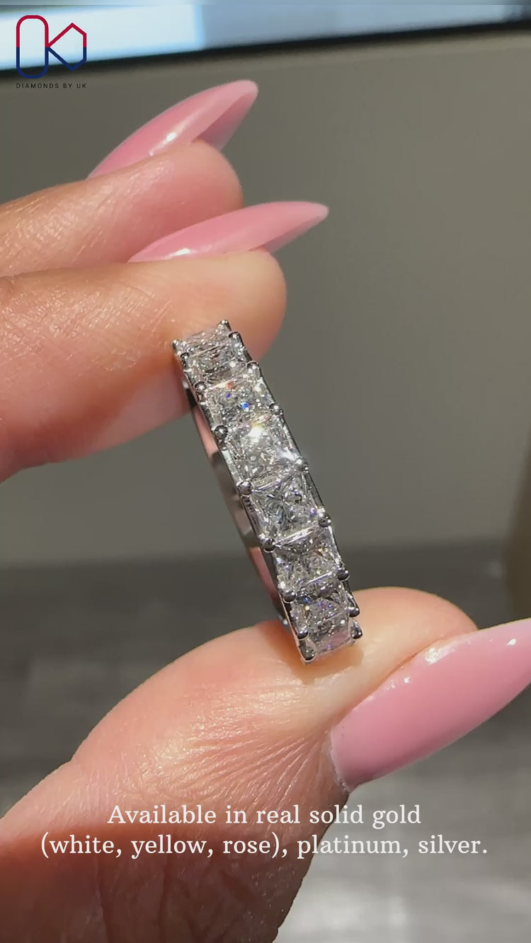 Elegant princess cut eternity band designed for timeless beauty.

