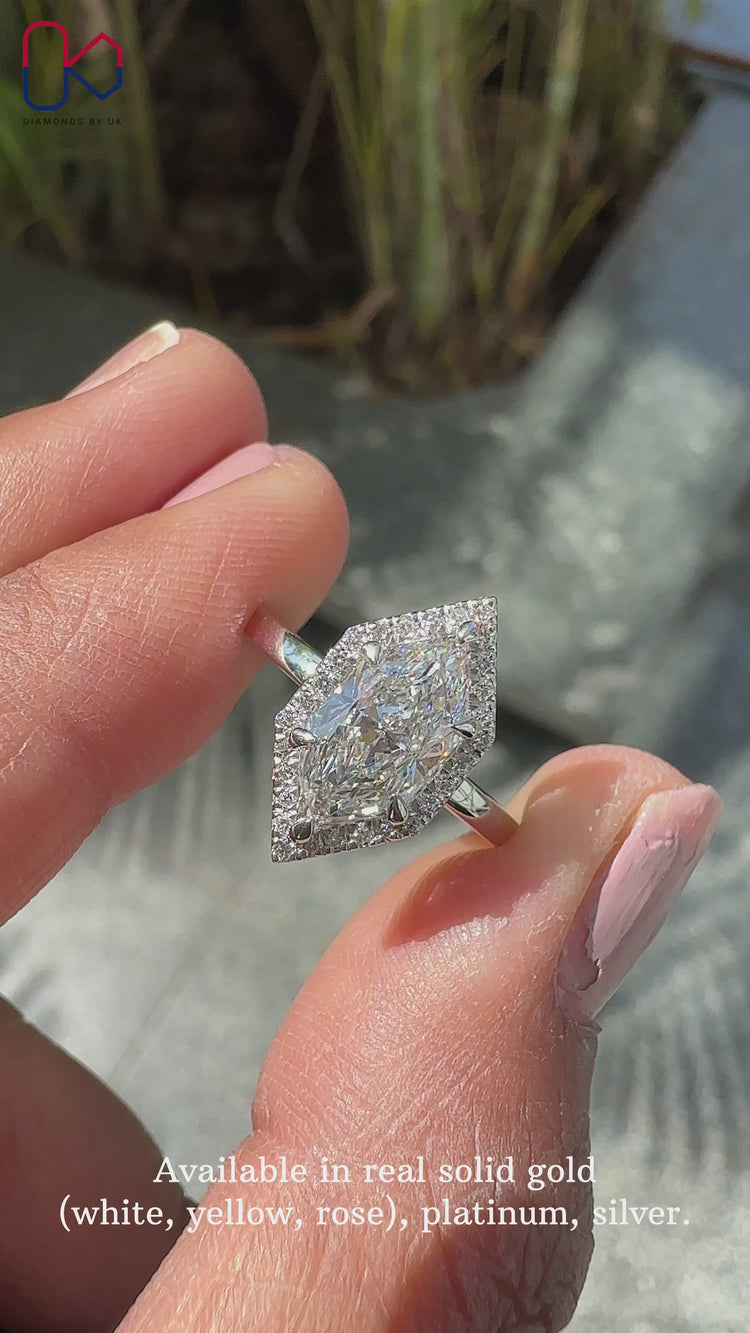 Halo diamond ring set in a beautiful white gold ring setting.
