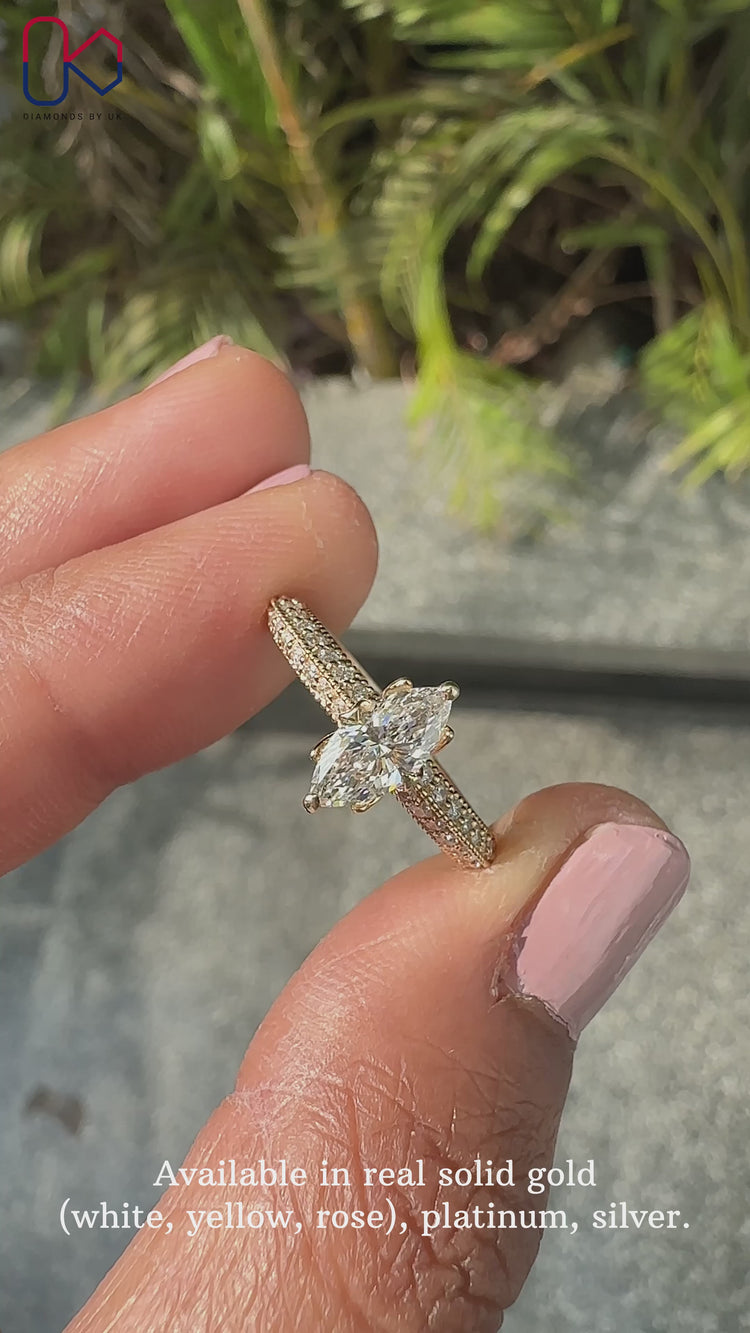 Two sided pave set engagement ring in yellow gold.
