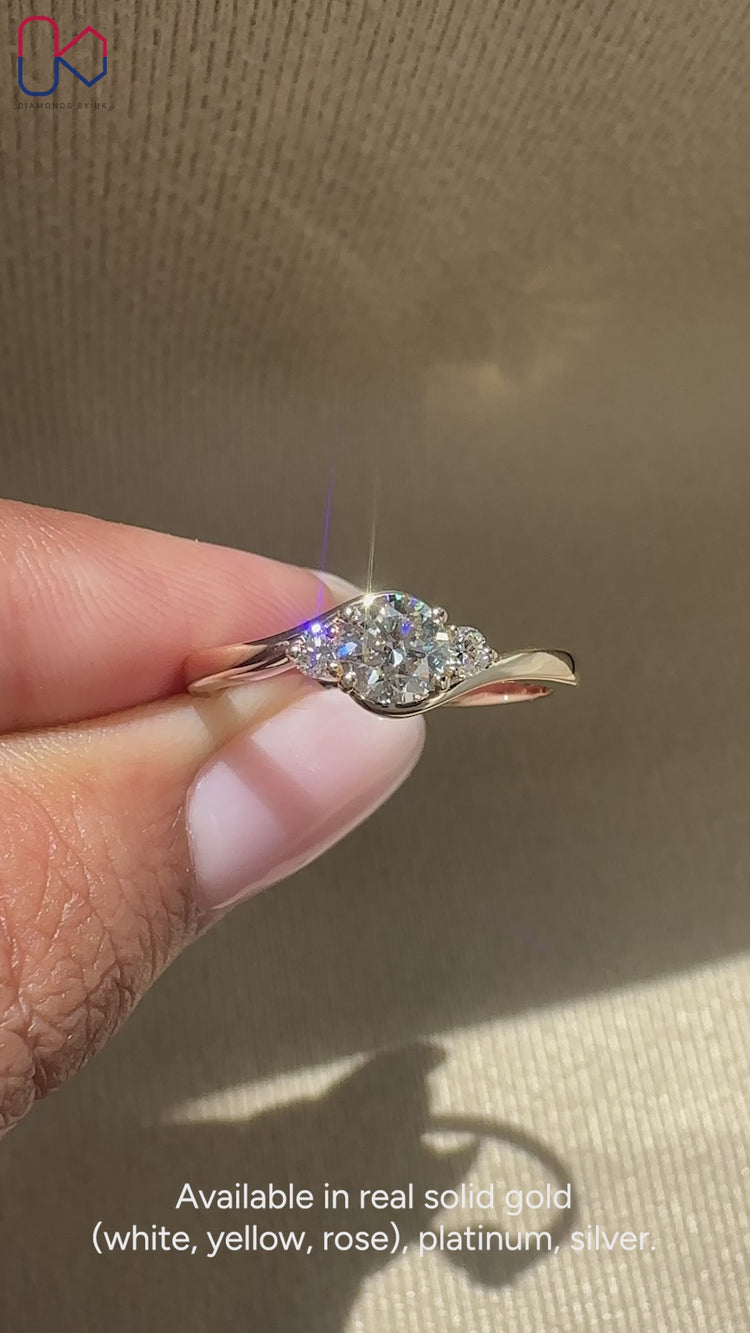 Gold Ring With Three Stones featuring a stunning design.
