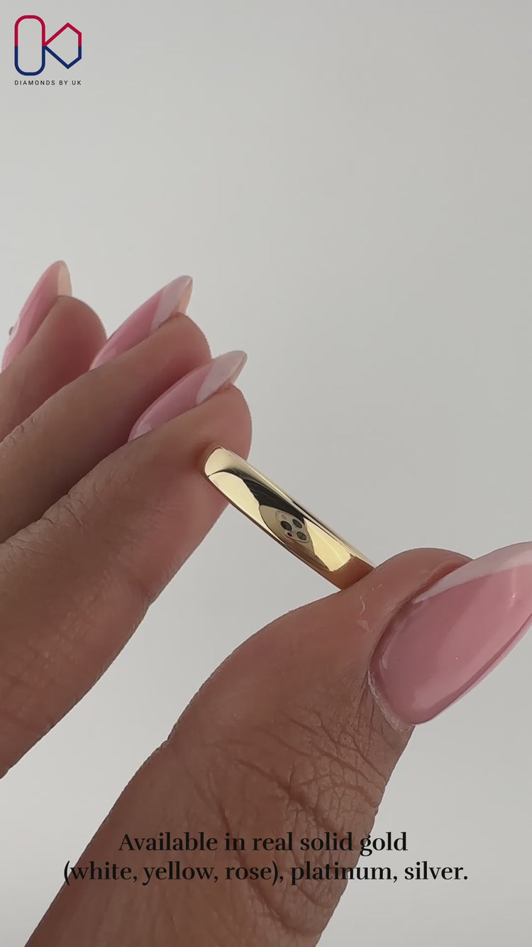 Simple wedding band made as a comfort fit band.
