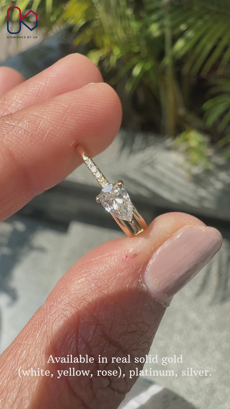 Elegant one side pave ring featuring brilliant pave diamonds for extra sparkle.
