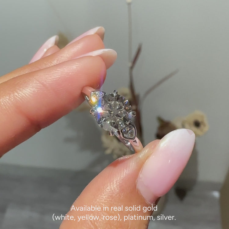 IGI certified lab grown diamond ring with bridge accents.
