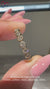 Elegant gold band round diamond wedding band with a classic style.
