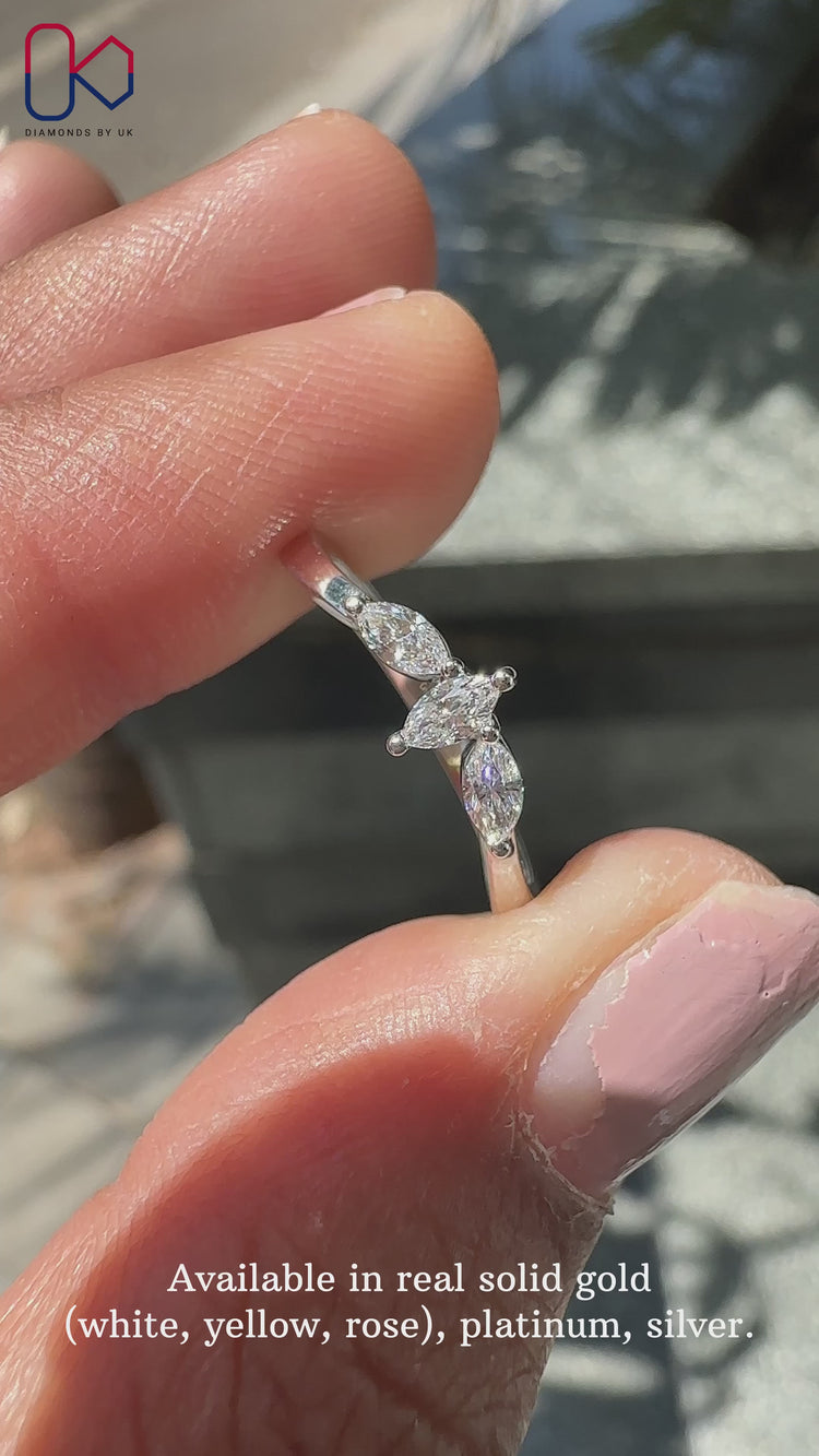 Classic 3 stone diamond wedding band with sparkling stones for timeless beauty.
