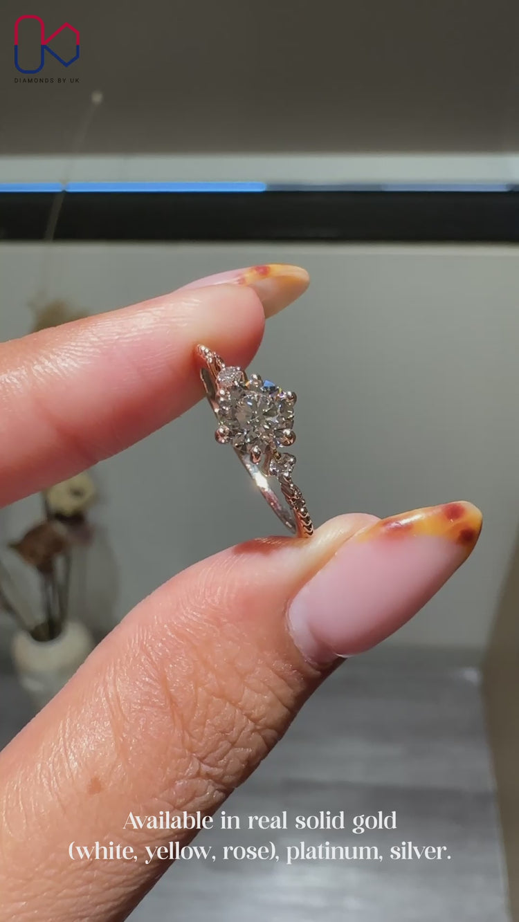 Handmade six claw prong diamond engagement ring.
