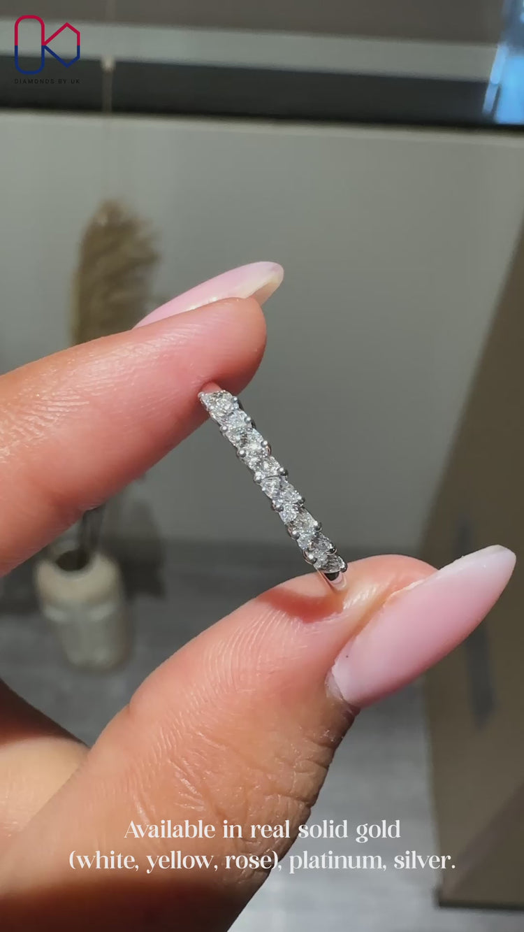 Marquise wedding band in white gold.
