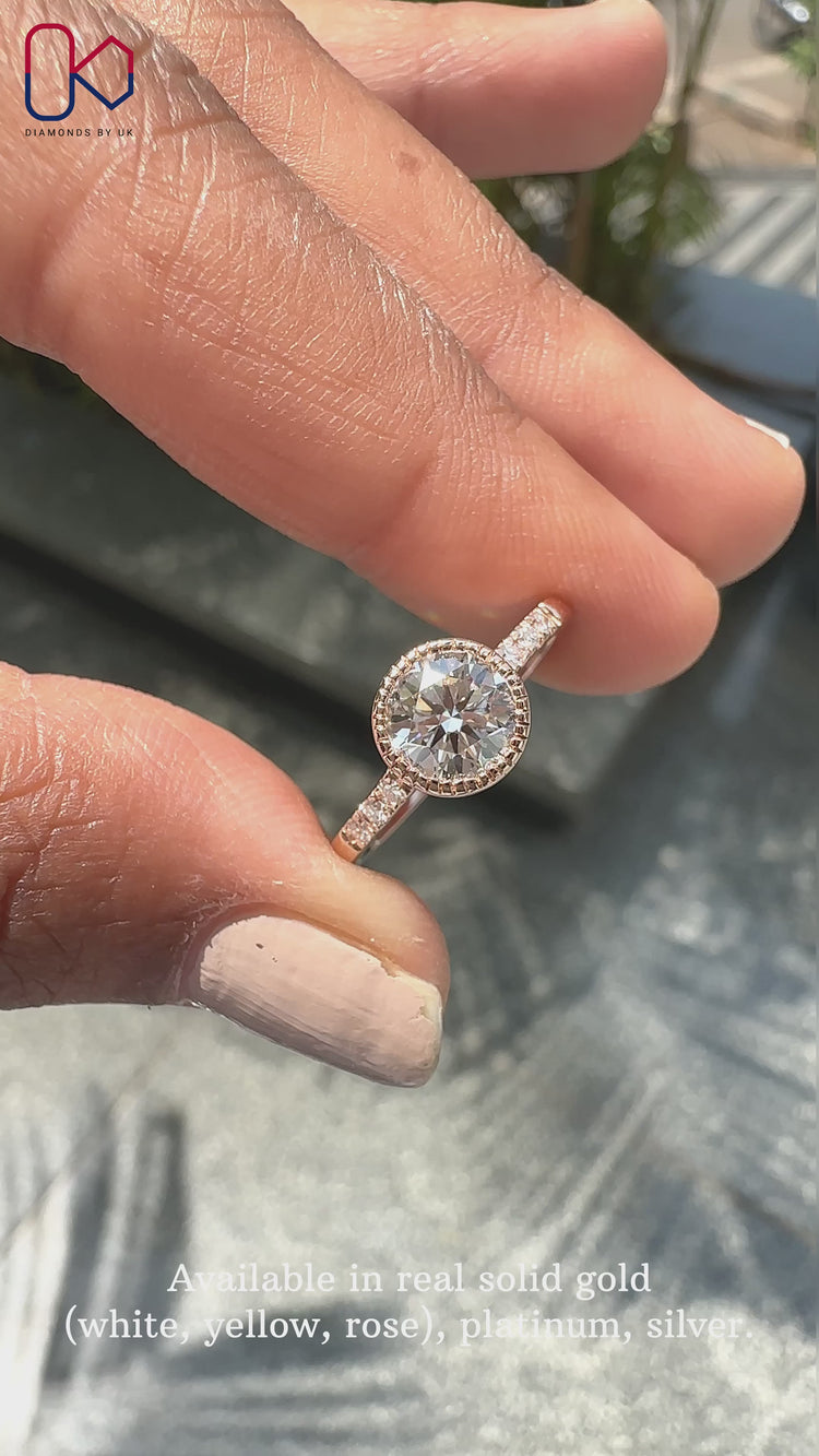 Round diamond ring in a pave setting.
