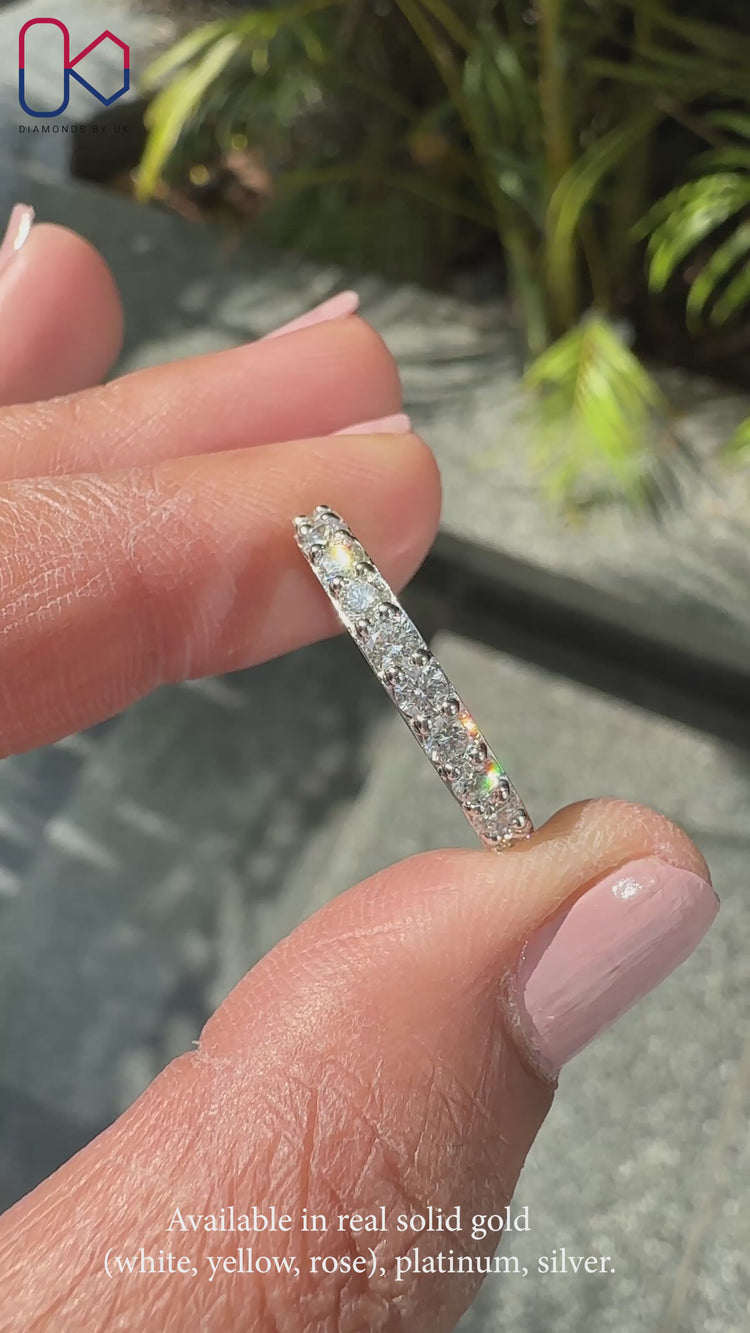 Elegant diamond eternity band for timeless beauty.
