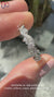 Round diamond half eternity band with twisted pavé style.