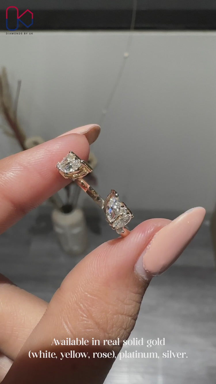 Marquise and round diamond band design.
