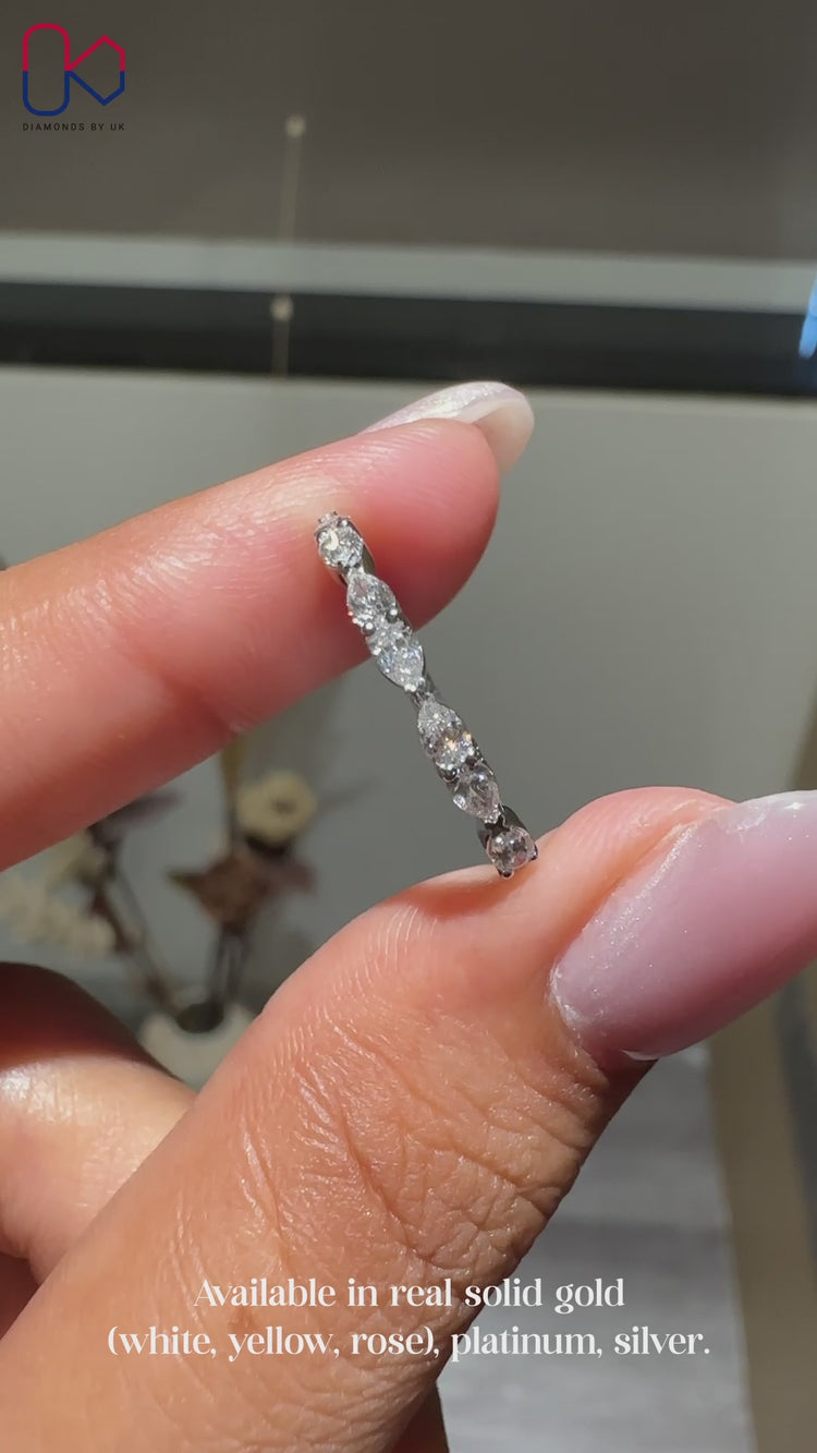 White gold wedding band with handmade band style.
