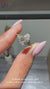 Muse setting engagement ring with pear cut diamond.
