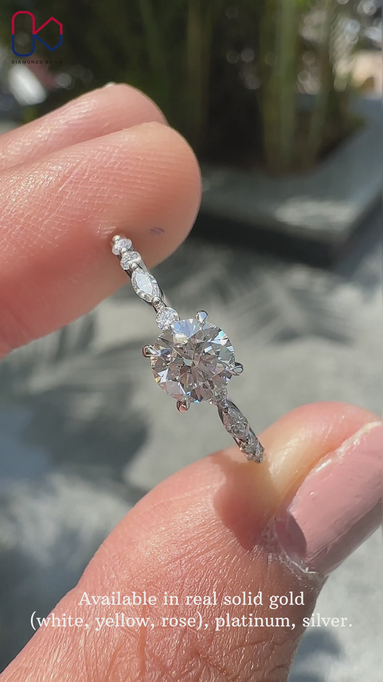 Elegant floating bubble band ring with a round cut diamond ring at the centre.
