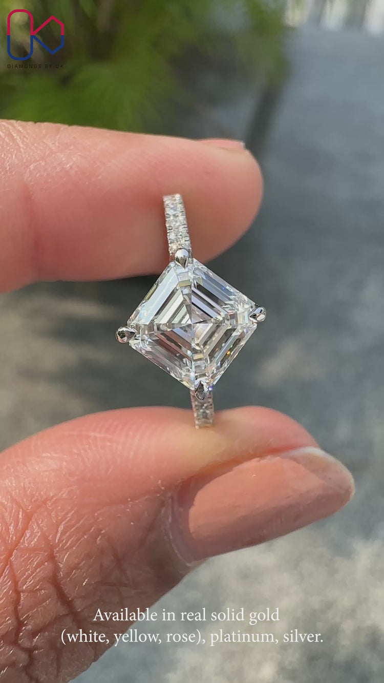 Elegant hidden halo engagement ring showcasing a round lab grown diamond.
