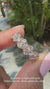 Lab grown round diamond band with cluster setting.