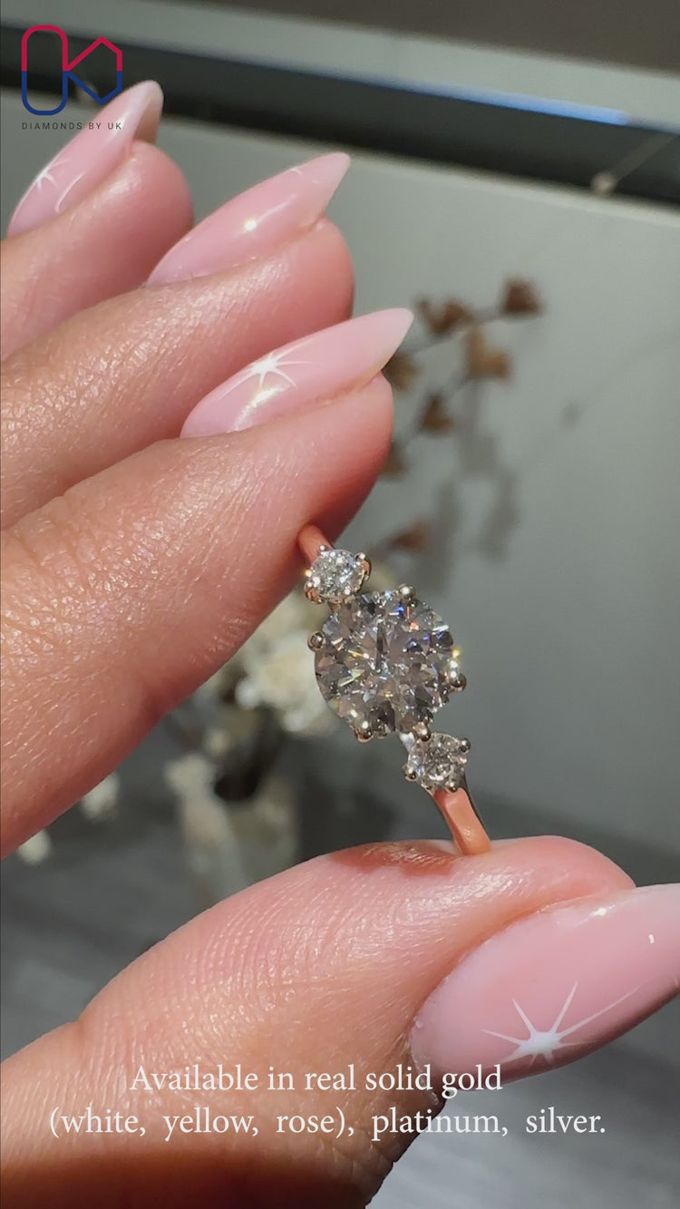 Stunning 3 Stone Round Diamond Ring for a classic and modern look.
