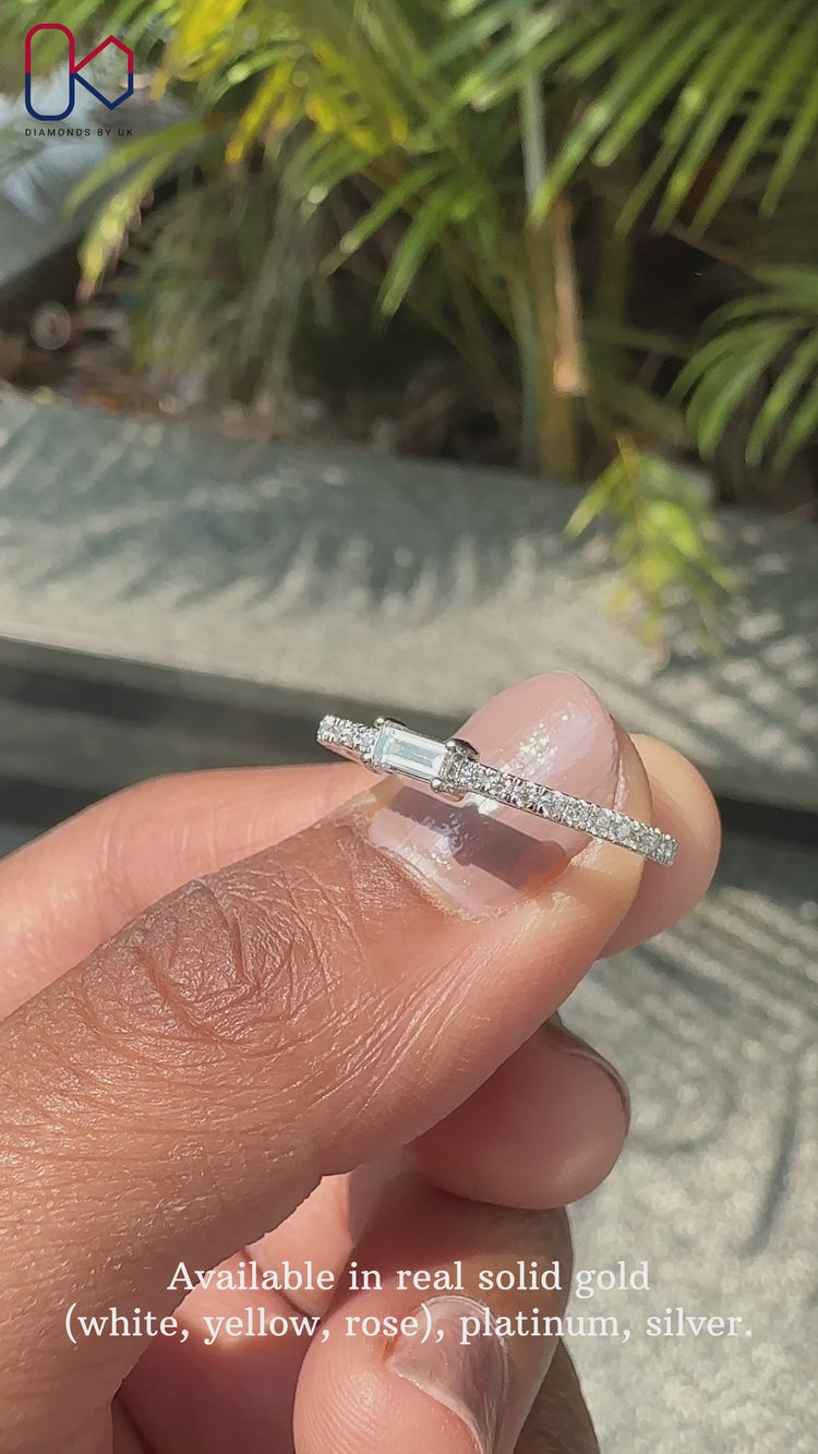 Half eternity wedding band with a mix of baguette and round diamonds.
